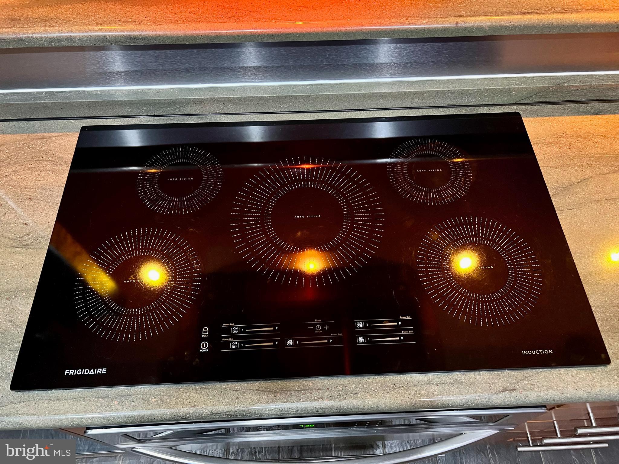 9701 Fields Road, Unit 201 Gaithersburg, MD 20878 - Photo 18 of 68 Induction cooktop