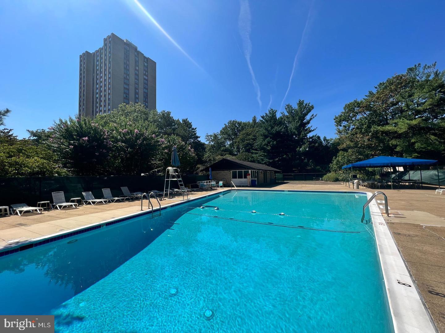 9701 Fields Road, Unit 201 Gaithersburg, MD 20878 - Photo 53 of 68 Pool - photo summertime (taken in summer)