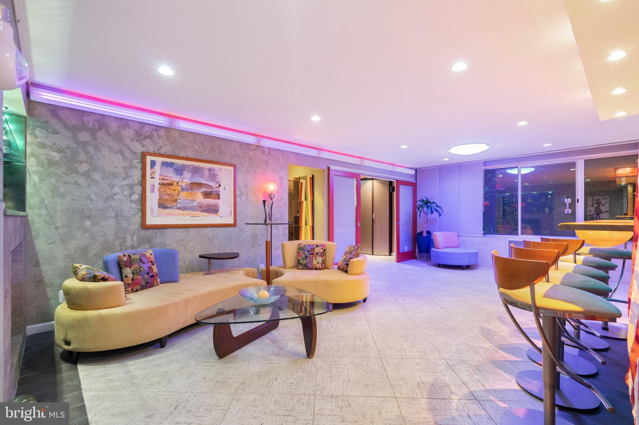 9701 Fields Road, Unit 201 Gaithersburg, MD 20878 - Photo 7 of 68 Family room - night-time ambiance