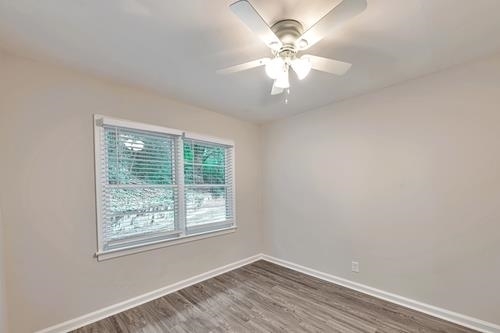 551 Wimbledon Road Northeast, Unit B Atlanta, GA 30324 - Photo 18 of 20 a view of a livingroom with a window