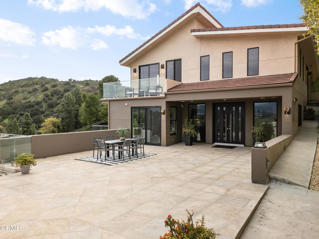 12480 Viewcrest Road Los Angeles, CA 91604 - Photo 14 of 69 a view of house with yard outdoor seating and barbeque oven