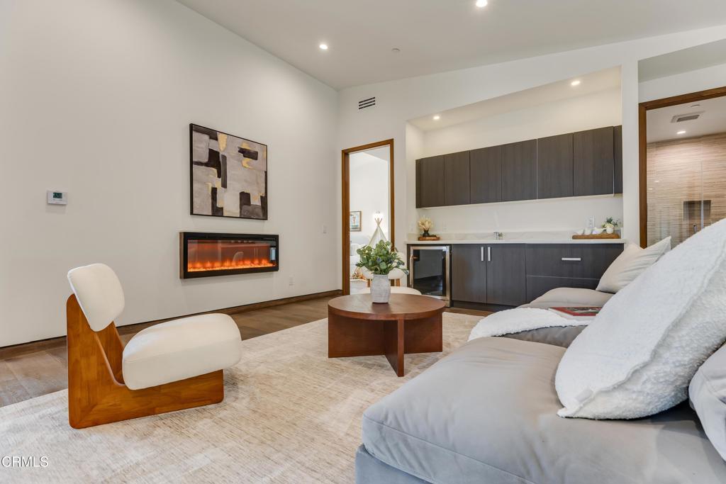 12480 Viewcrest Road Los Angeles, CA 91604 - Photo 22 of 69 a bedroom with furniture and a flat screen tv