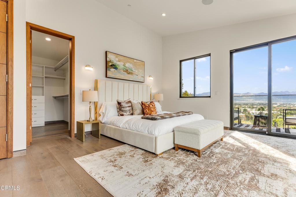 12480 Viewcrest Road Los Angeles, CA 91604 - Photo 25 of 69 a bed room with a bed and a large window