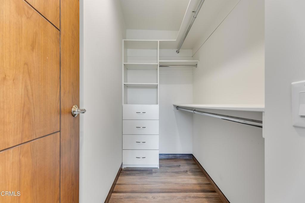12480 Viewcrest Road Los Angeles, CA 91604 - Photo 31 of 69 a view of walk in closet with empty racks
