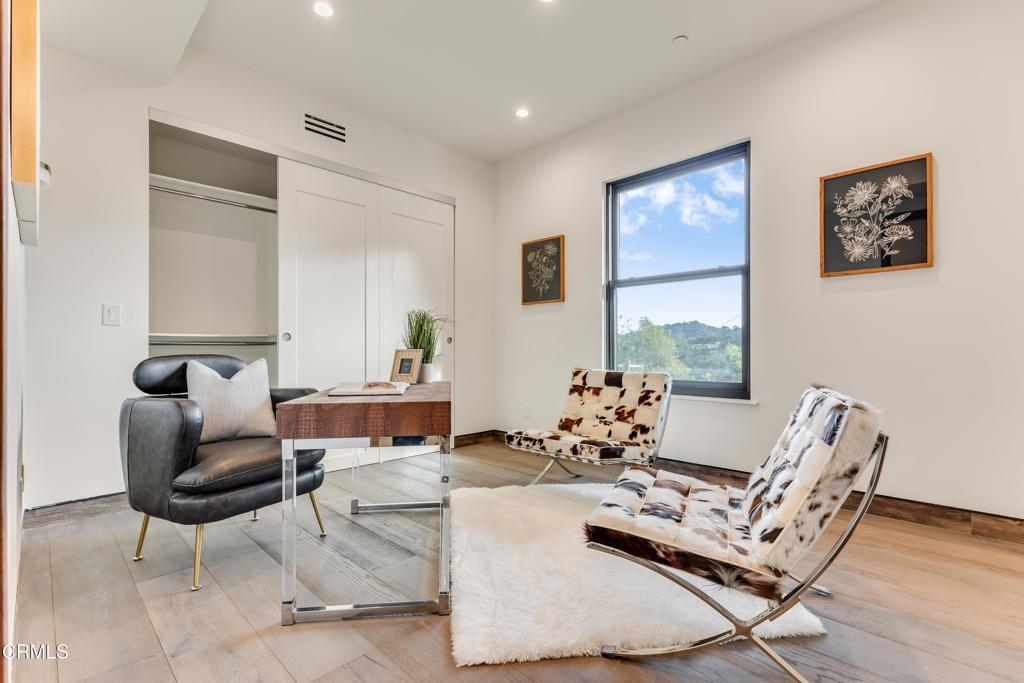 12480 Viewcrest Road Los Angeles, CA 91604 - Photo 53 of 69 a living room with furniture and a large window