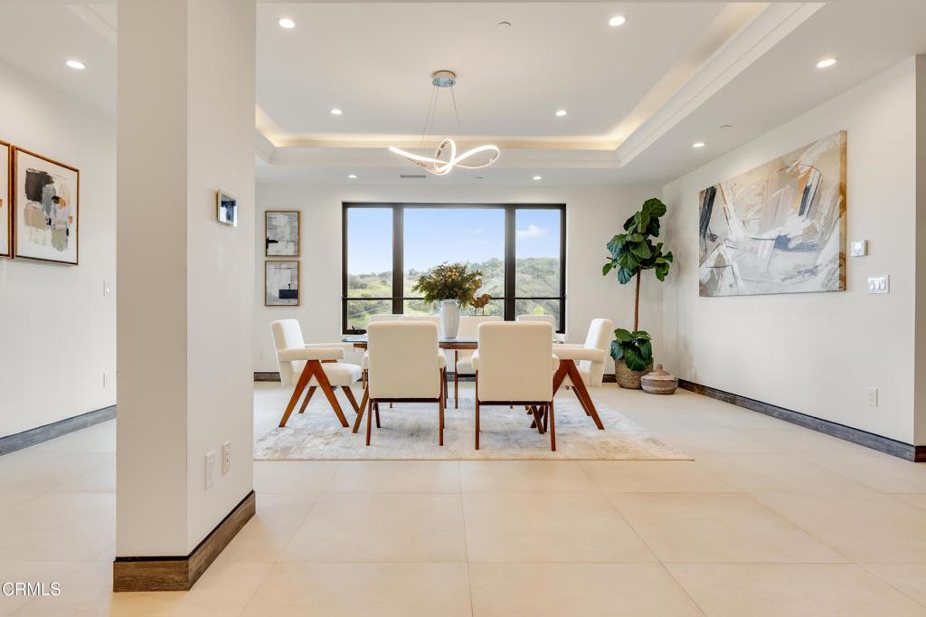 12480 Viewcrest Road Los Angeles, CA 91604 - Photo 56 of 69 a view of a dining room with furniture window and wooden floor