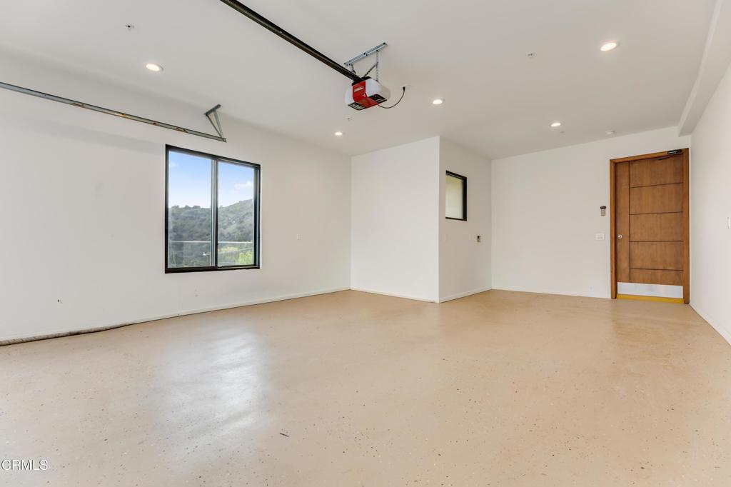 12480 Viewcrest Road Los Angeles, CA 91604 - Photo 64 of 69 an empty room with windows and closet