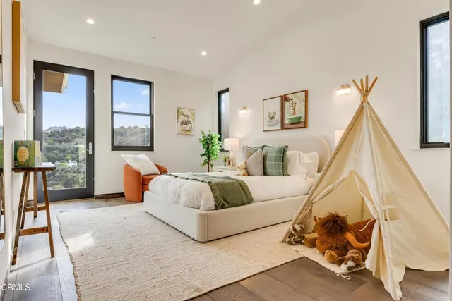 a view of house with a yard outdoor seating and barbeque oven