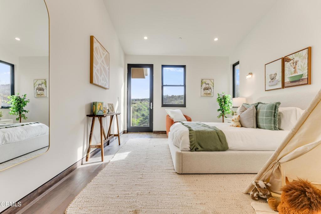 12480 Viewcrest Road Los Angeles, CA 91604 - Photo 8 of 69 a living room with furniture and a large window