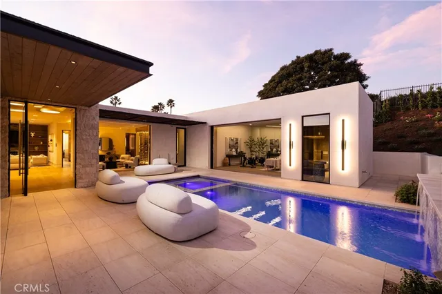 a lobby with furniture and rug