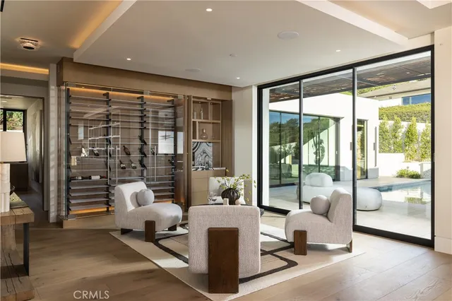 a living room with couch and a large window