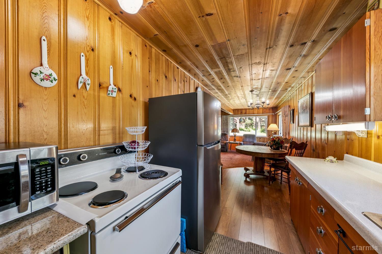 7075 Mount Ralston Road Twin Bridges, CA 95735 - Photo 20 of 26 a kitchen with a sink appliances and cabinets