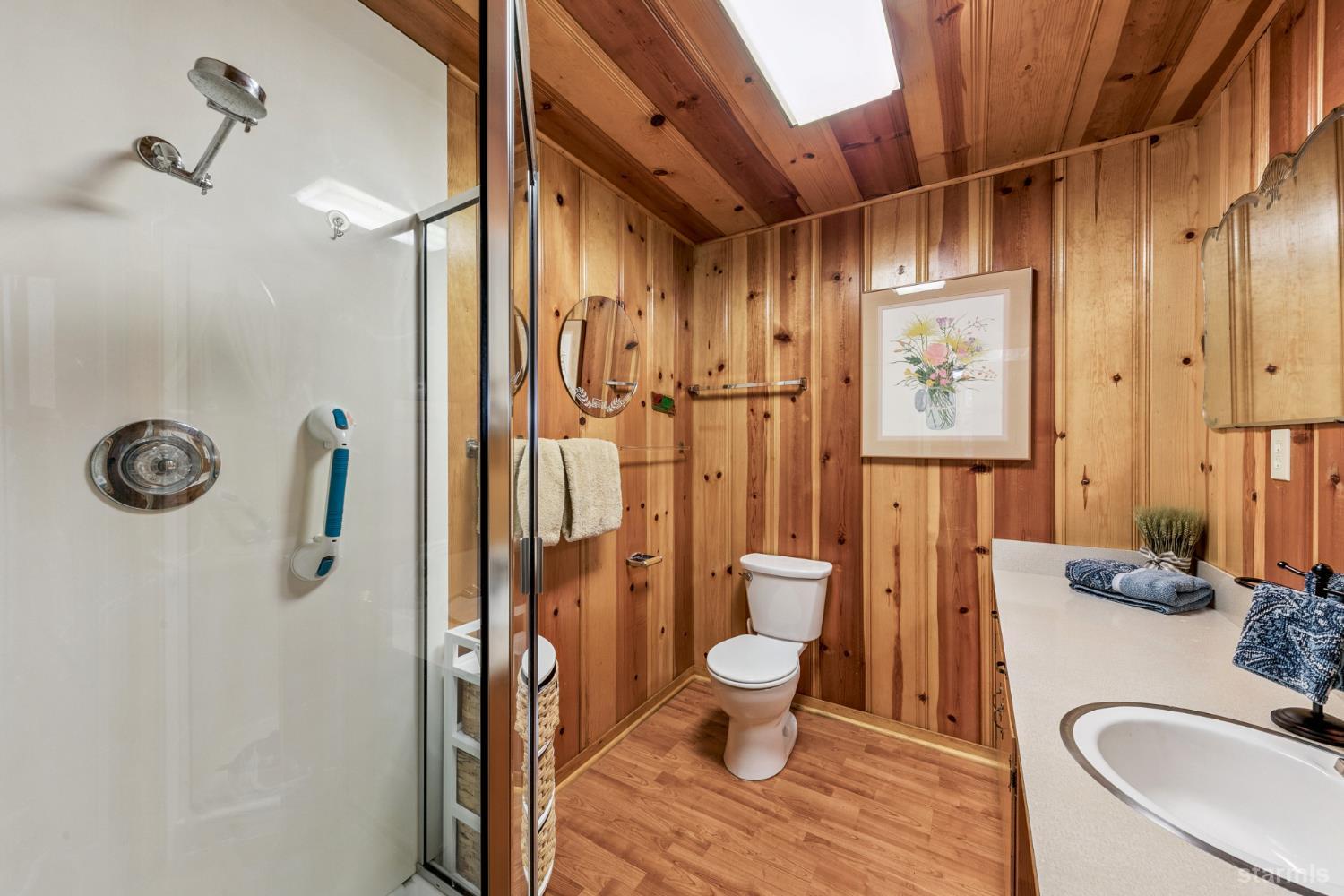 7075 Mount Ralston Road Twin Bridges, CA 95735 - Photo 22 of 26 a bathroom with a sink toilet and shower