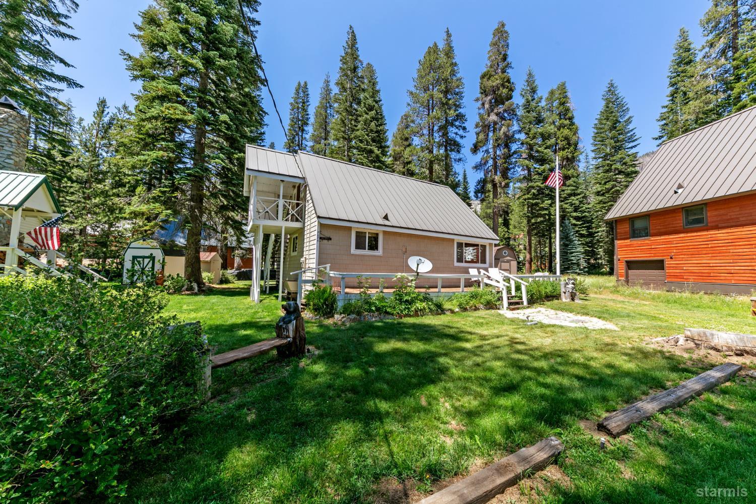 7075 Mount Ralston Road Twin Bridges, CA 95735 - Photo 3 of 26 a view of a house with backyard and a tree