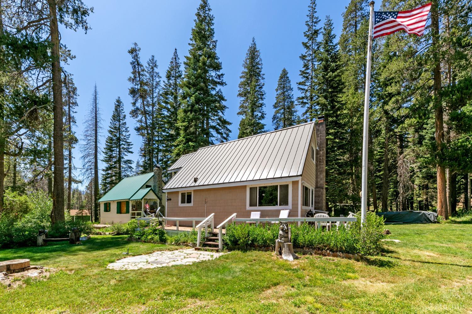7075 Mount Ralston Road Twin Bridges, CA 95735 - Photo 4 of 26 a front view of a house with garden