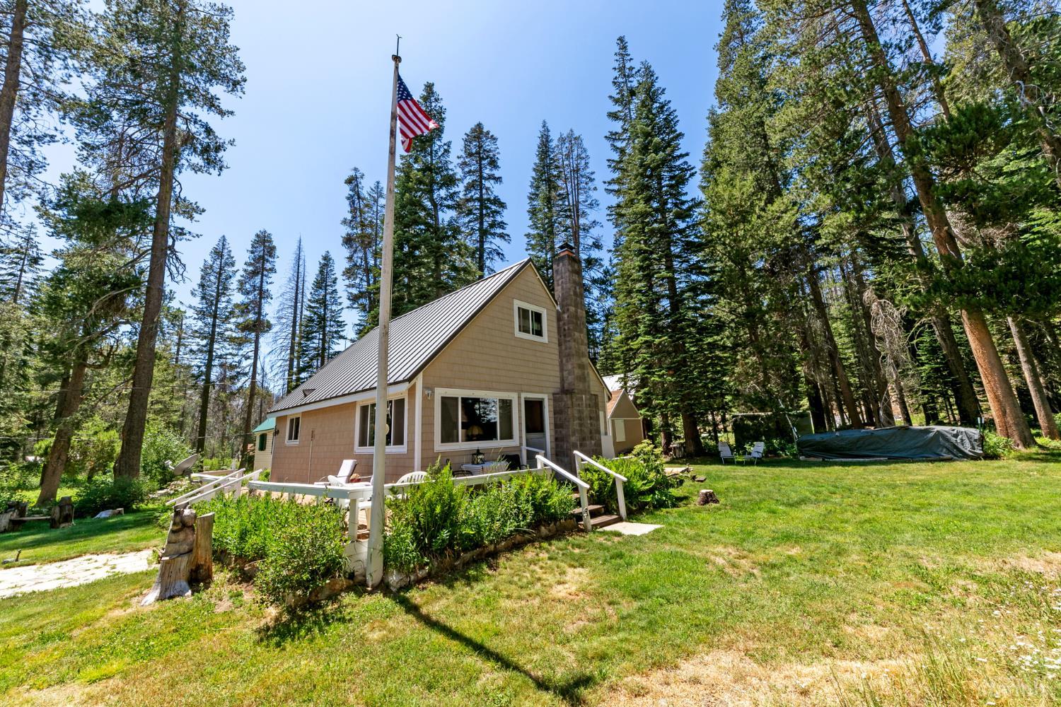 7075 Mount Ralston Road Twin Bridges, CA 95735 - Photo 6 of 26 a front view of a house with garden