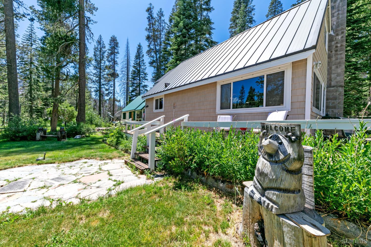 7075 Mount Ralston Road Twin Bridges, CA 95735 - Photo 8 of 26 a front view of a house with garden