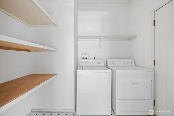 a utility room with dryer and washer