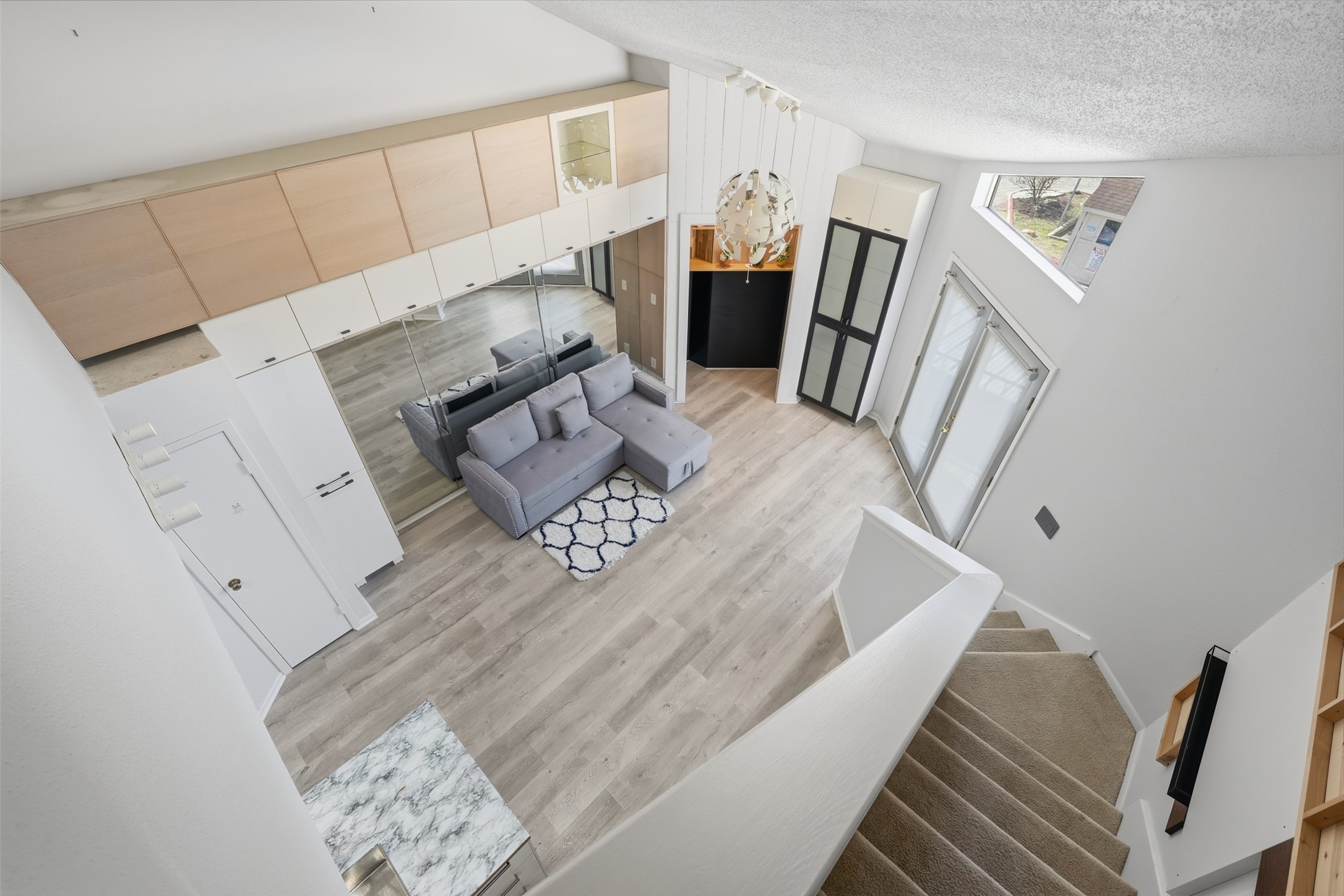 10855 Meadowglen Lane, Unit 823 Houston, TX 77042 - Photo 21 of 35 a view of living room with furniture and wooden floor