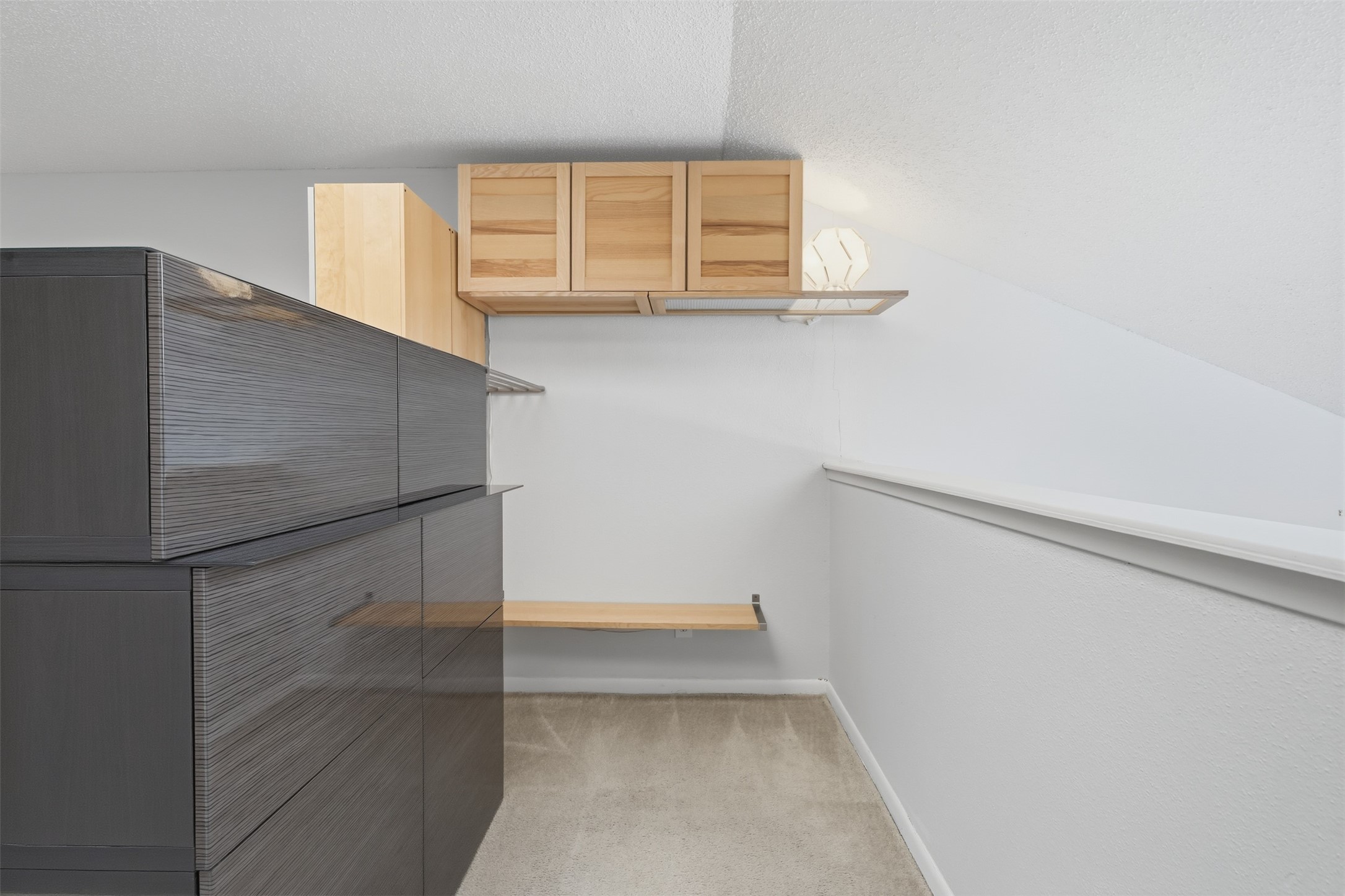 10855 Meadowglen Lane, Unit 823 Houston, TX 77042 - Photo 22 of 35 a view of an empty walk in closet