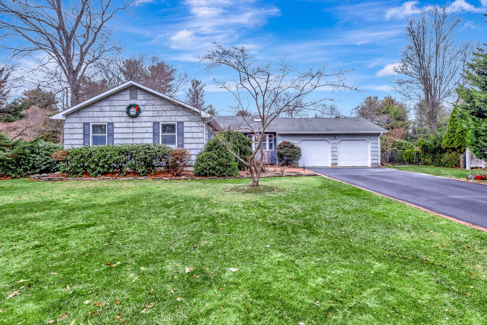 45 A Eckernkamp Drive Smithtown, NY 11787 - Photo 1 of 1 a front view of a house with garden