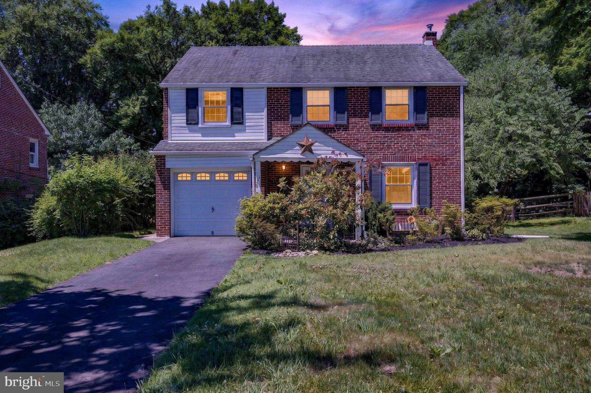 128 Boncouer Road Cheltenham, PA 19012 - Photo 1 of 31 Charming brick home with inviting glow.