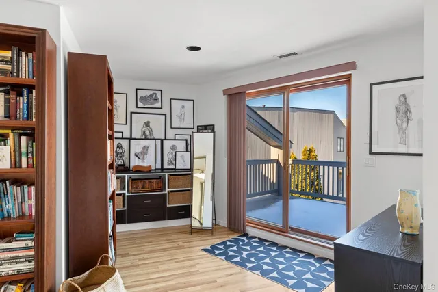 a view of a bedroom with furniture and staircase