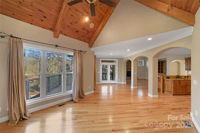 a view of porch with wooden floor
