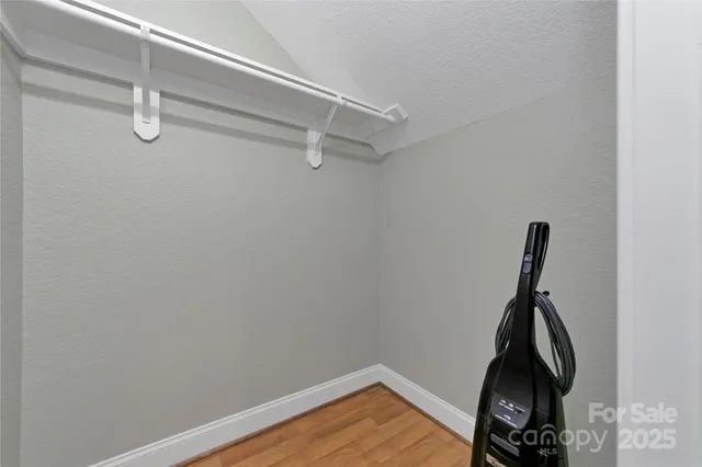 a view of a livingroom with wooden floor