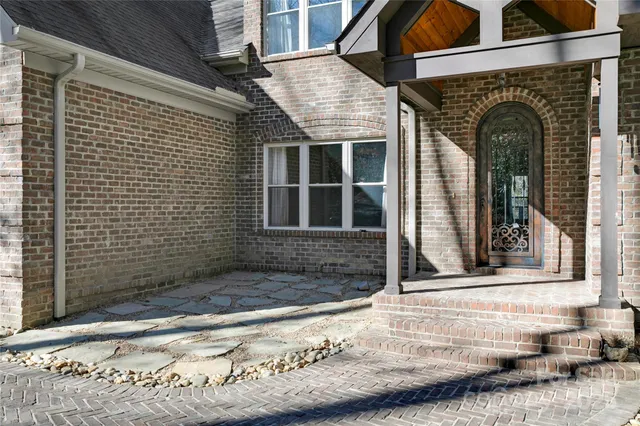 a front view of a house with garage