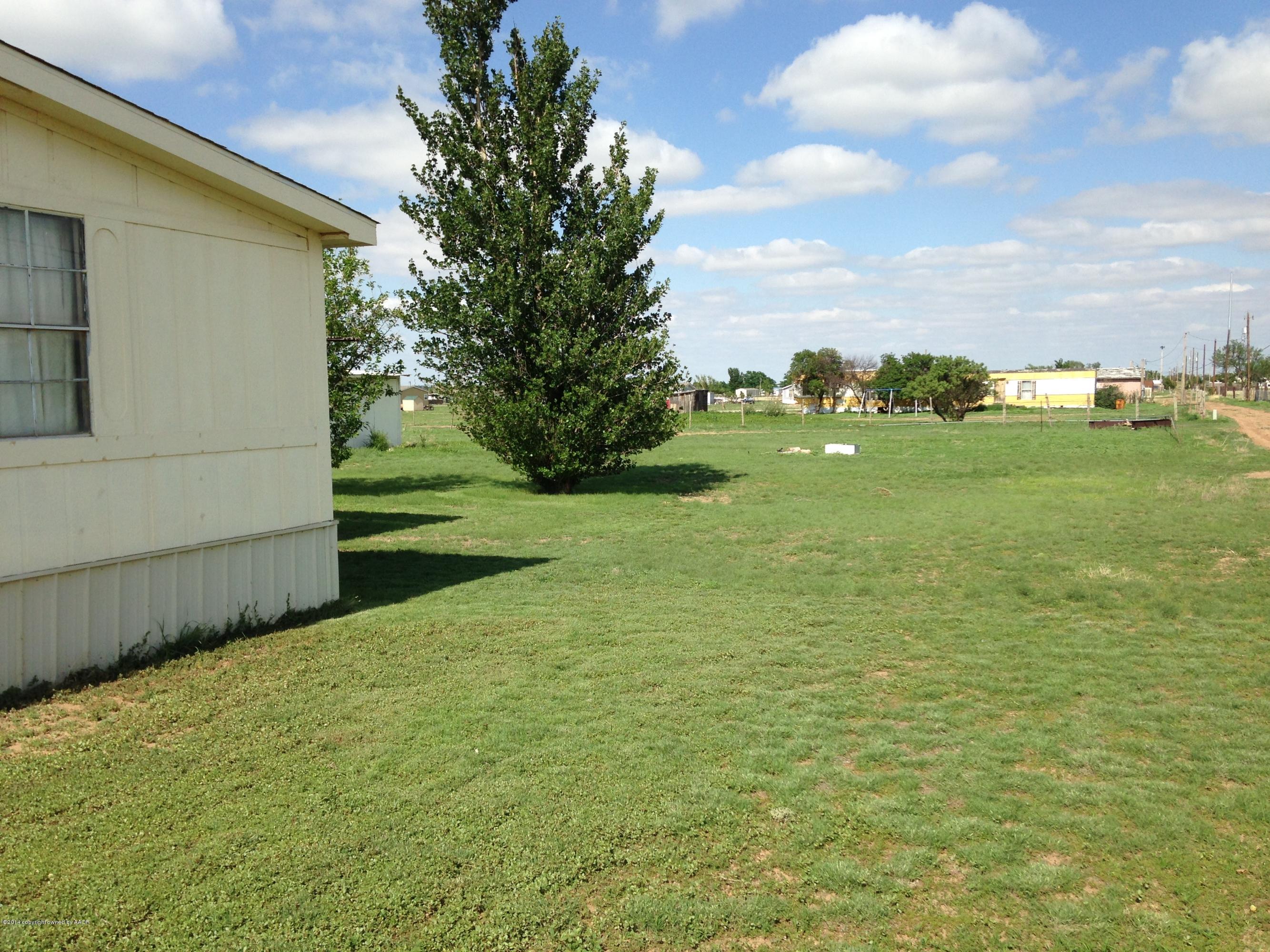 14175 Savannah Road Amarillo, TX 79118 - Photo 3 of 3 a view of a backyard of the house