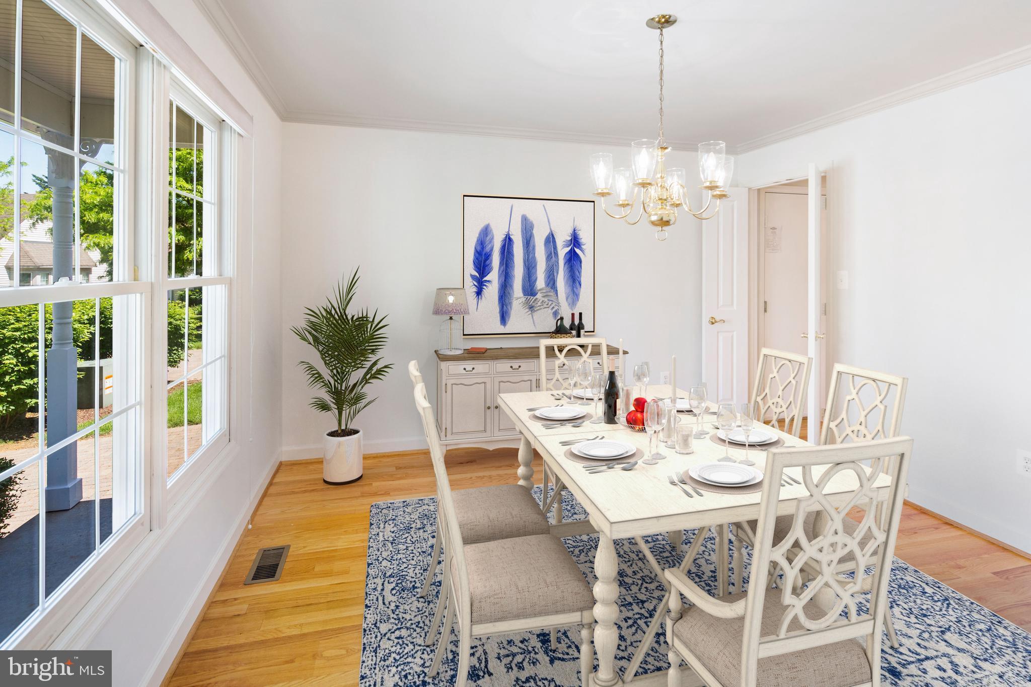2437 Bear Den Road Frederick, MD 21701 - Photo 4 of 28 Light filled dining room with hardwood floors