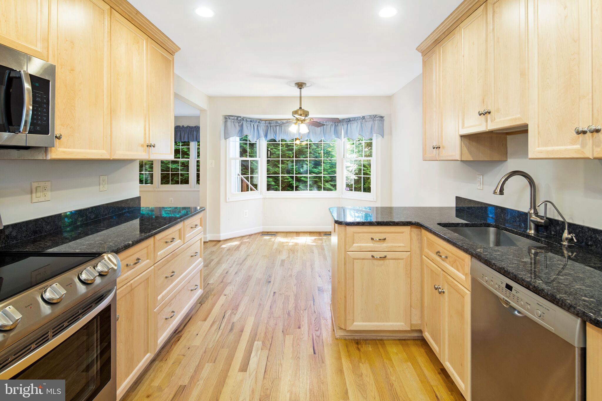 2437 Bear Den Road Frederick, MD 21701 - Photo 10 of 28 Updated kitchen leads to breakfast nook