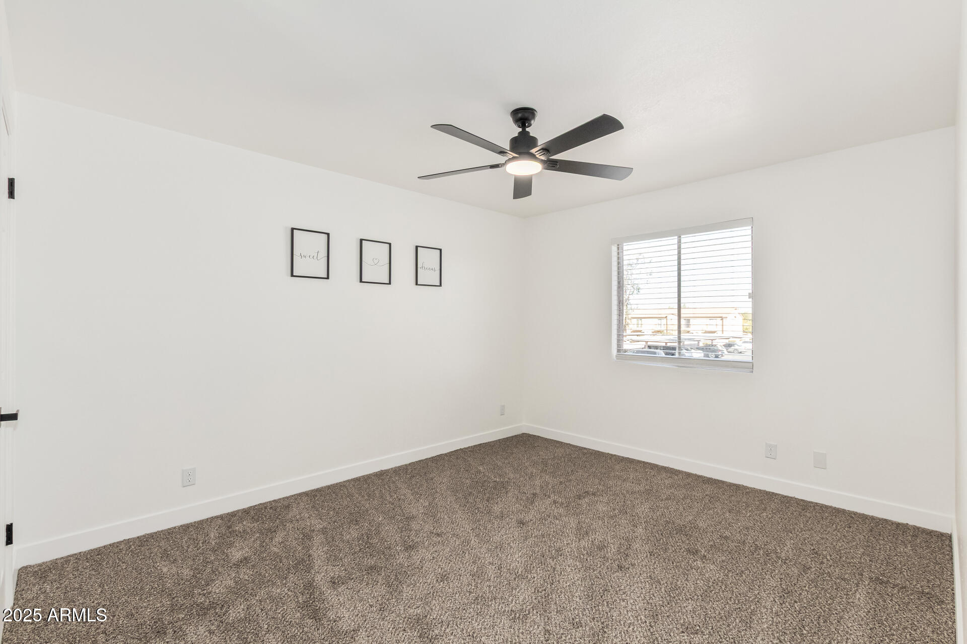 623 West Guadalupe Road, Unit 228 Mesa, AZ 85210 - Photo 7 of 14 a view of a big room with carpet