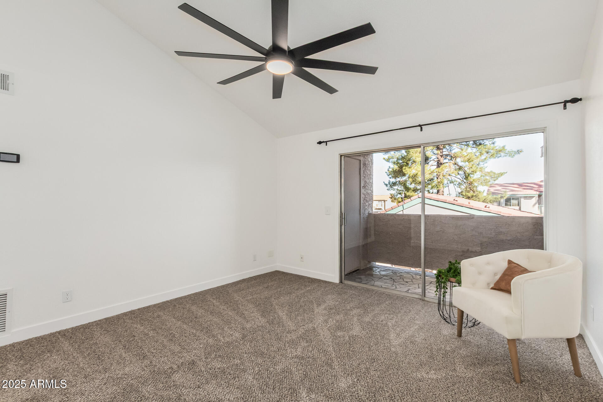 623 West Guadalupe Road, Unit 228 Mesa, AZ 85210 - Photo 8 of 14 a view of an empty room with a window
