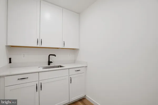 a view of a room with racks on the wall