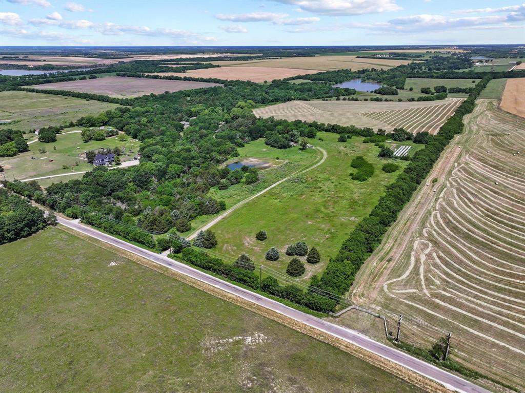 747 Vineyard Road Gunter, TX 75058 - Photo 2 of 32 a view from a balcony with outdoor space