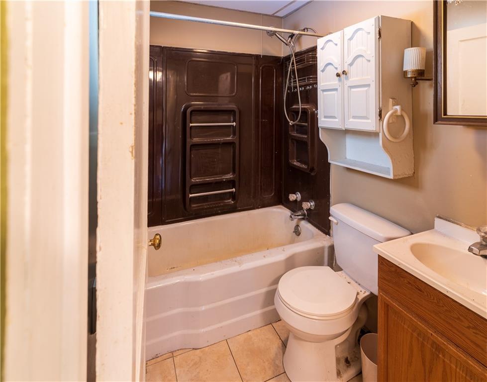 348 South Neshannock Road Hermitage, PA 16148 - Photo 11 of 15 a bathroom with a toilet and a shower