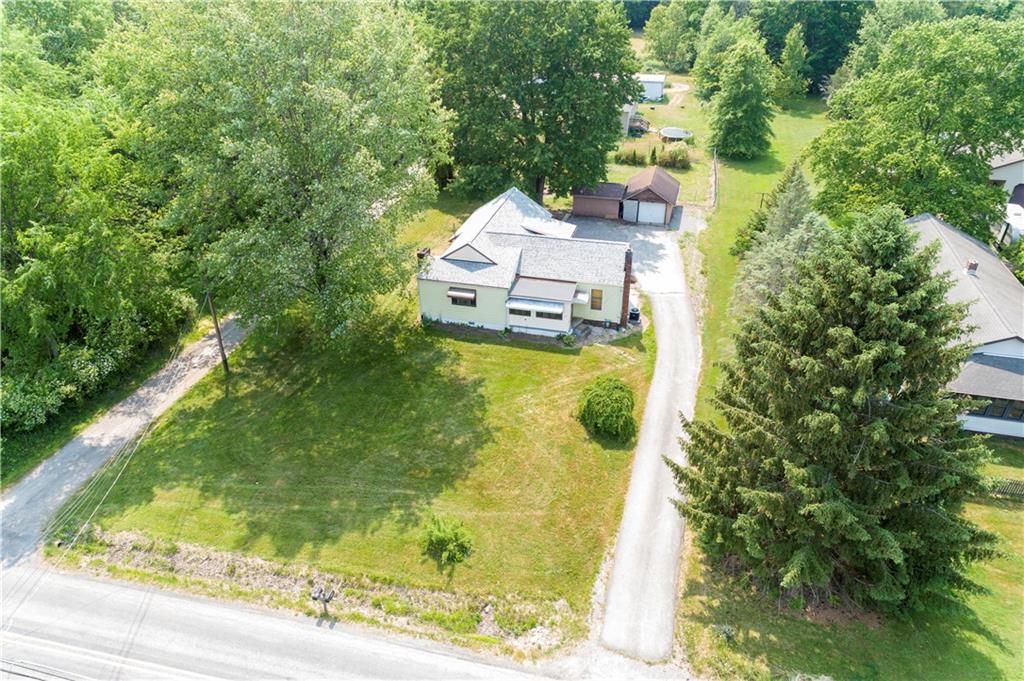 348 South Neshannock Road Hermitage, PA 16148 - Photo 12 of 15 a view of a small yard with large trees