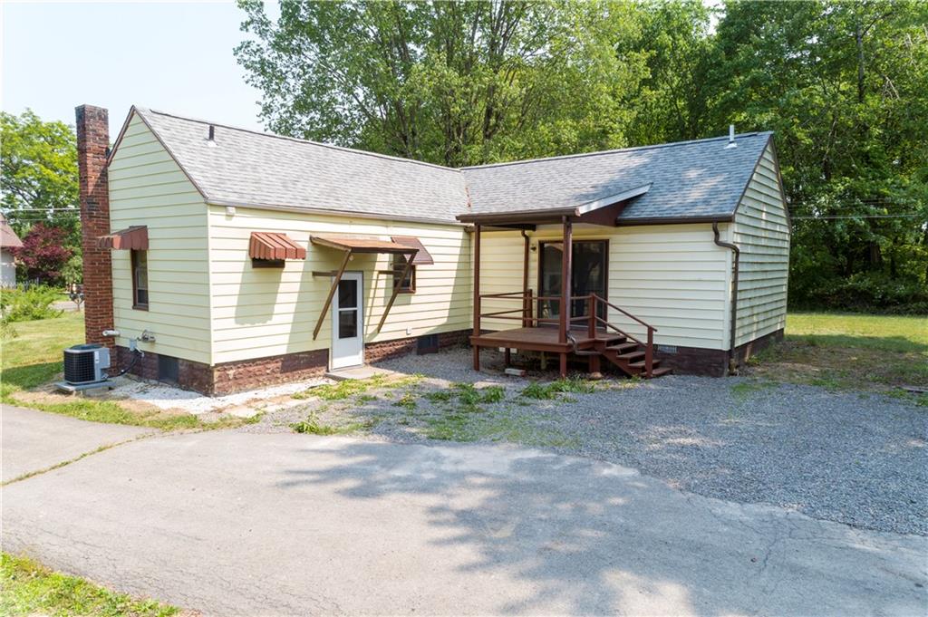 348 South Neshannock Road Hermitage, PA 16148 - Photo 13 of 15 a view of a house with yard and garage