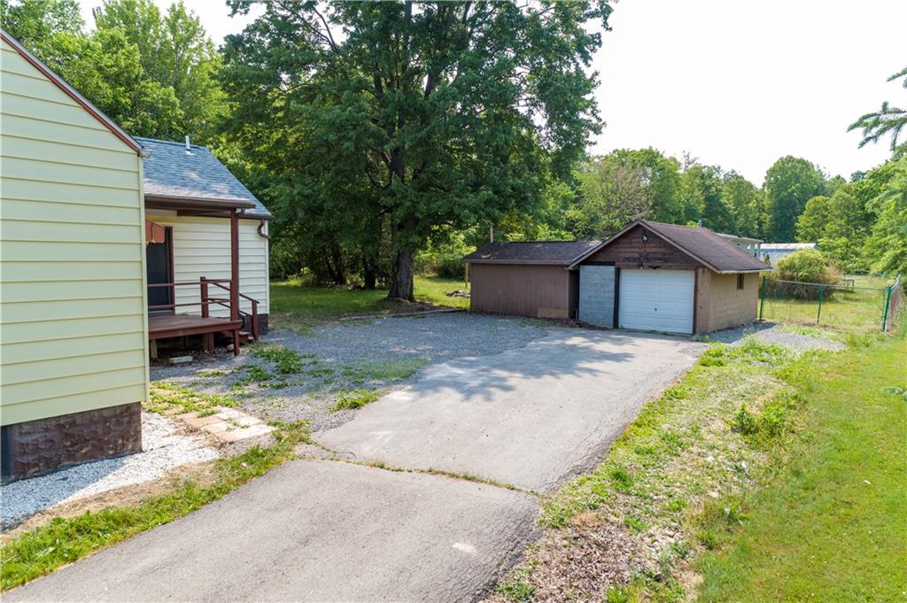348 South Neshannock Road Hermitage, PA 16148 - Photo 14 of 15 a view of a house with a yard