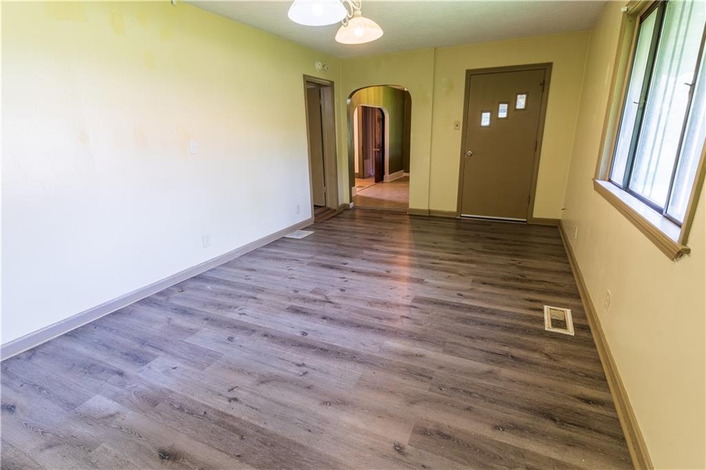 348 South Neshannock Road Hermitage, PA 16148 - Photo 10 of 15 a view of a room with wooden floor and window