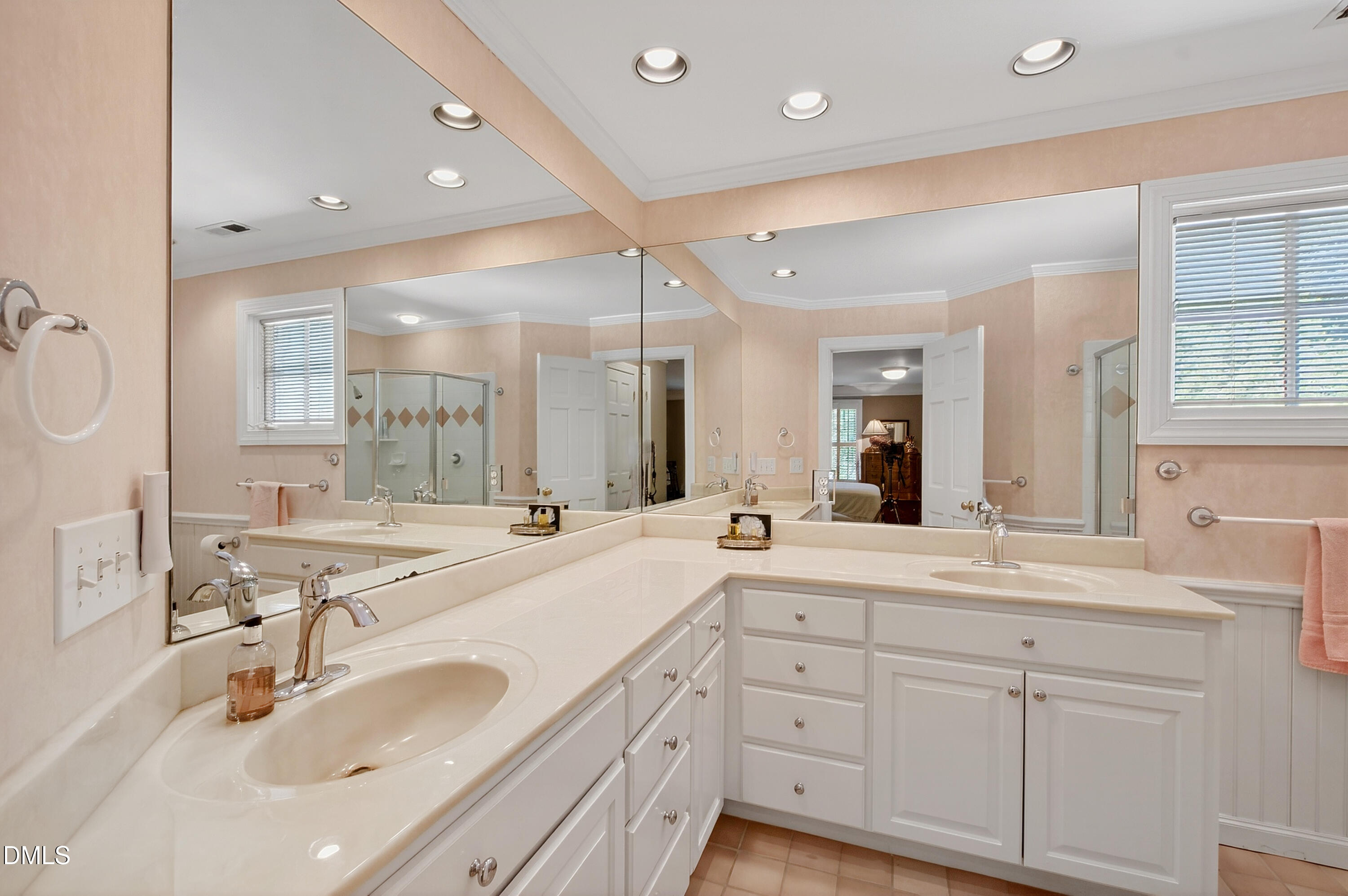 3708 Lubbock Drive Raleigh, NC 27612 - Photo 39 of 64 a bathroom with a sink double vanity granite tub shower and a mirror