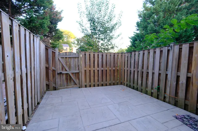 a view of a wooden fence