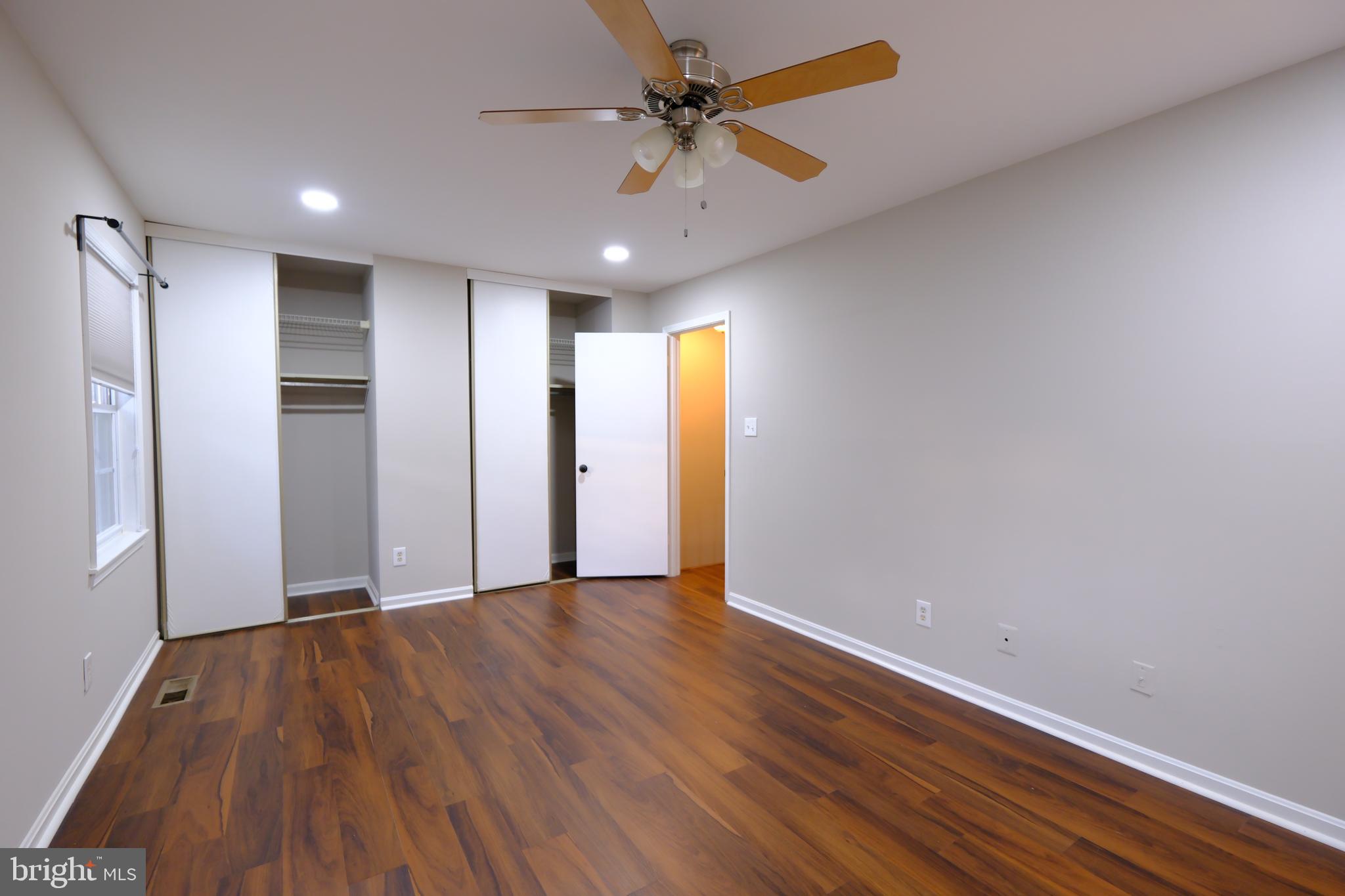 128 Bent Twig Lane, Unit 345 Gaithersburg, MD 20878 - Photo 4 of 17 a view of an empty room with a window
