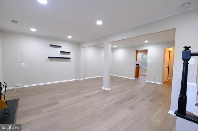 a view of a livingroom with wooden floor