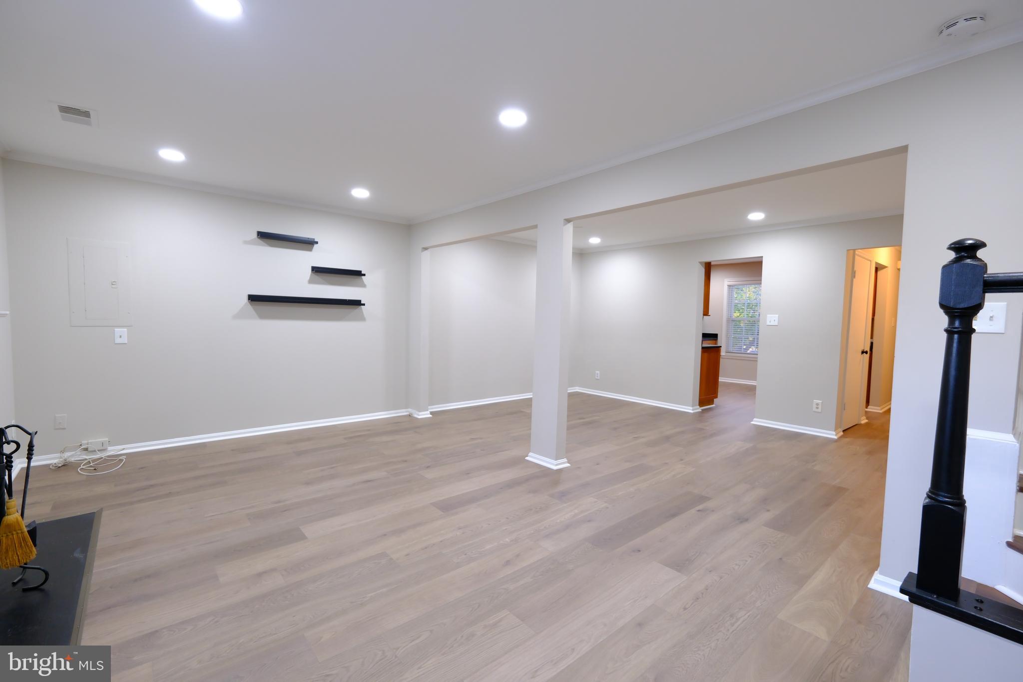 128 Bent Twig Lane, Unit 345 Gaithersburg, MD 20878 - Photo 8 of 17 a view of a livingroom with wooden floor