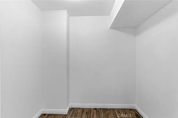a bathroom with a shower and toilet