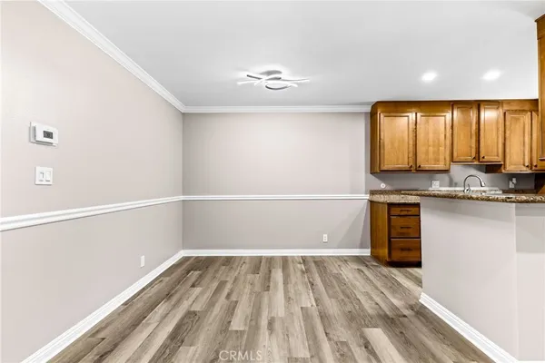 a kitchen with stainless steel appliances granite countertop counter space a sink and cabinets