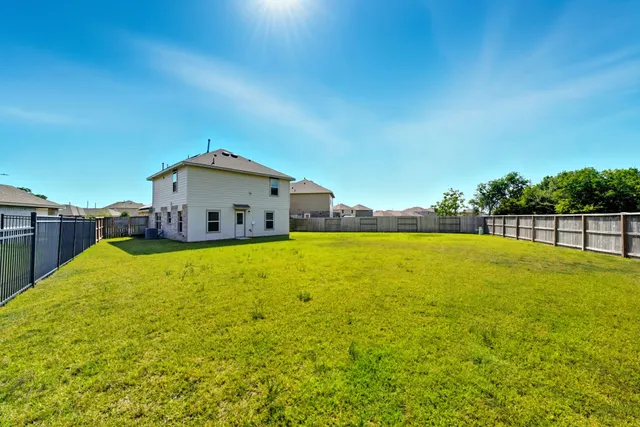 a house view with a outdoor space